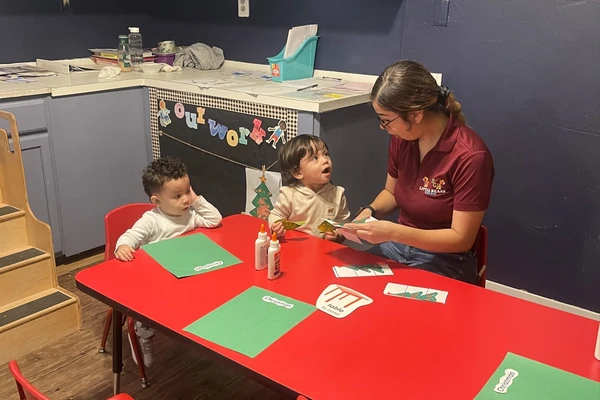 teacher one on one child learning preschool